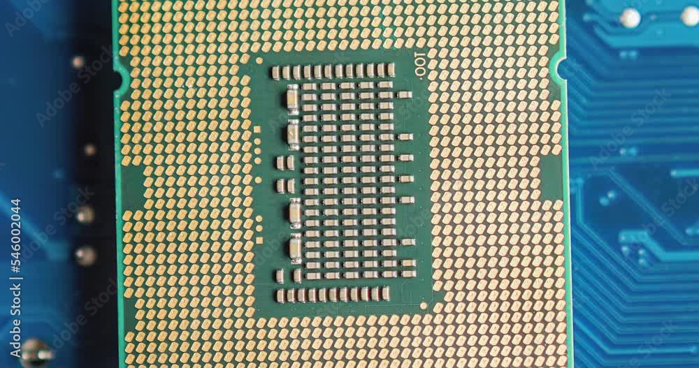 Details of a computer board with microchip as concept background Details of a computer board with microchip as concept background
