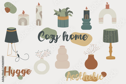 Cozy home decor set, hygge aesthetic home objects. Candles, lamps, flowers, vases and lettering. Hand drawn autumn home cozy elements in Scandinavian style. © SoykA_art