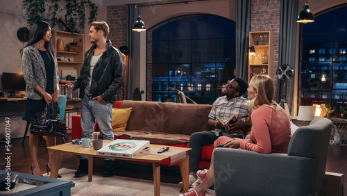 Television Sitcom about Two Couples. Four Diverse Friends Talking in Living Room, Deciding to Go Out. Clever Dialogue Comedy Sketch. Show Broadcasting on Network Channel, On Demand Streaming Service.