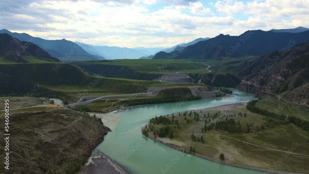 Aerial: Mountain valley. The confluence of the Chuya River and Katun Aerial: Mountain valley. The confluence of the Chuya River and Katun