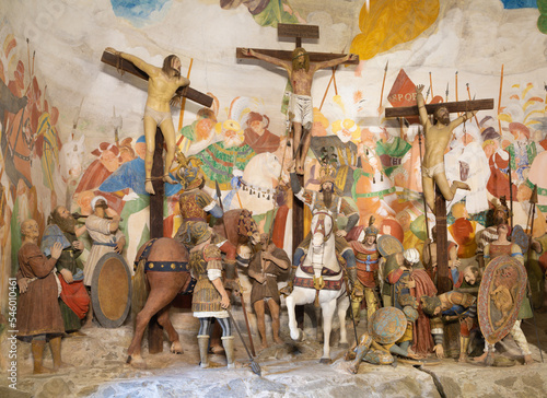 VARALLO, ITALY - JULY 17, 2022: The sculptural group of Crucifixion in the chapel of church Basilica del Sacro Monte by Gaudenzio Ferrari - terracotta (1520-1528). photo