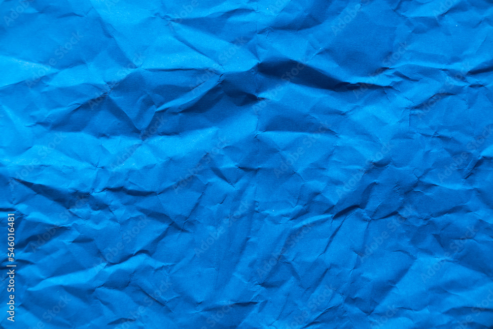 Obraz premium Blue crumpled paper for background.