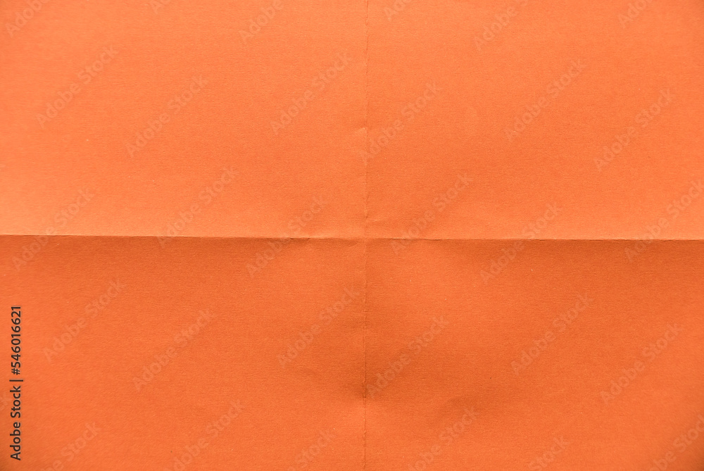 Fototapeta premium Folded orange paper for background.