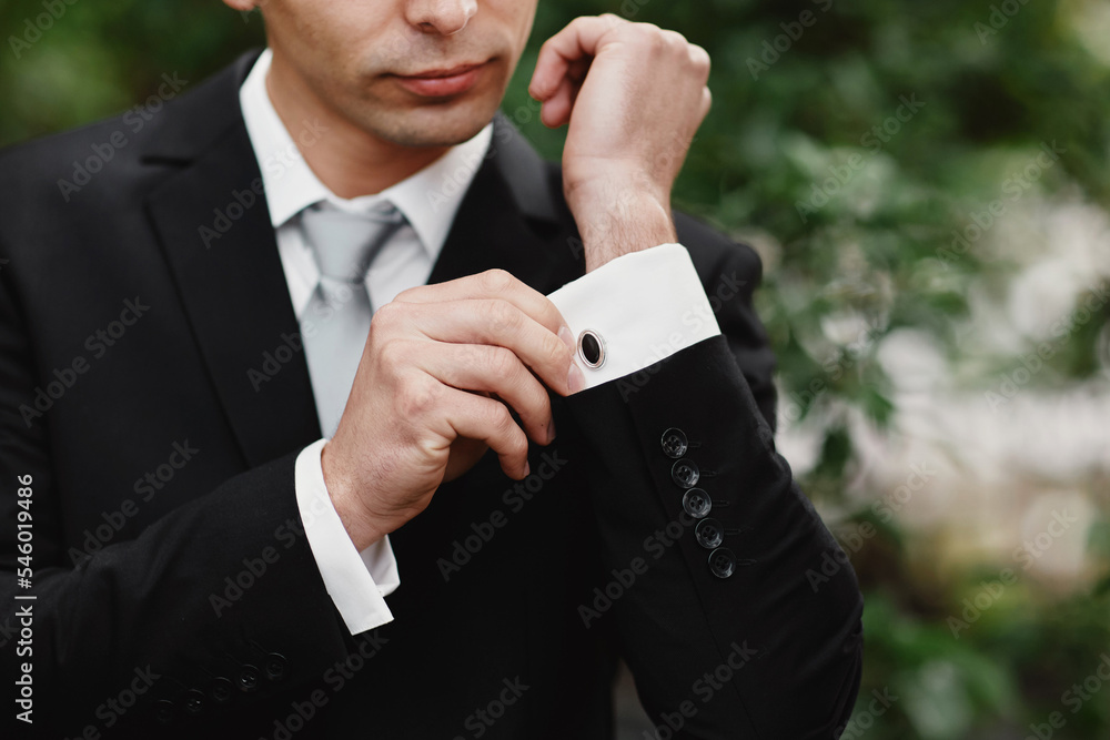 stylish confident man in suit and tie outdoors, reception at luxury wedding, rich graduation at school or university, business meeting stylish confident man in suit and tie outdoors, reception at luxury wedding, rich graduation at school or university, business meeting