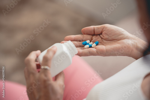 The picture of the drug in the hand of an elderly woman is a patient who has to take regular medication every day.