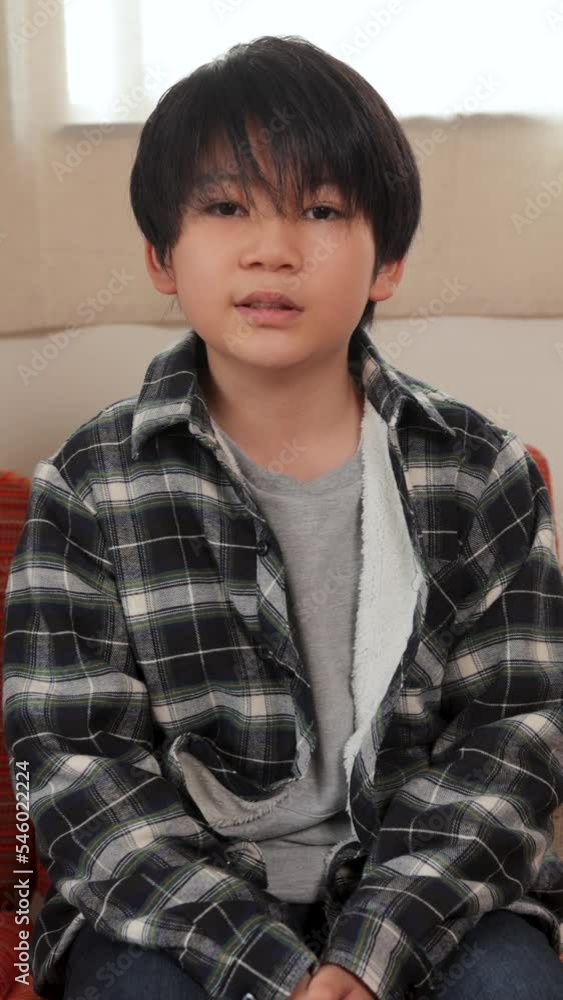 Vertical : Japanese boy introduces himself to the camera. 30P Vertical : Japanese boy introduces himself to the camera. 30P