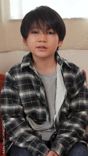 Vertical : Japanese boy introduces himself to the camera. 30P