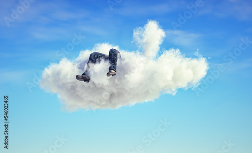 Man lays down on a cloud . Dreaming and aspiration concept.