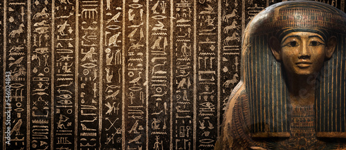 Fotografija Egyptian mummy on background of ancient Egyptian hieroglyphs