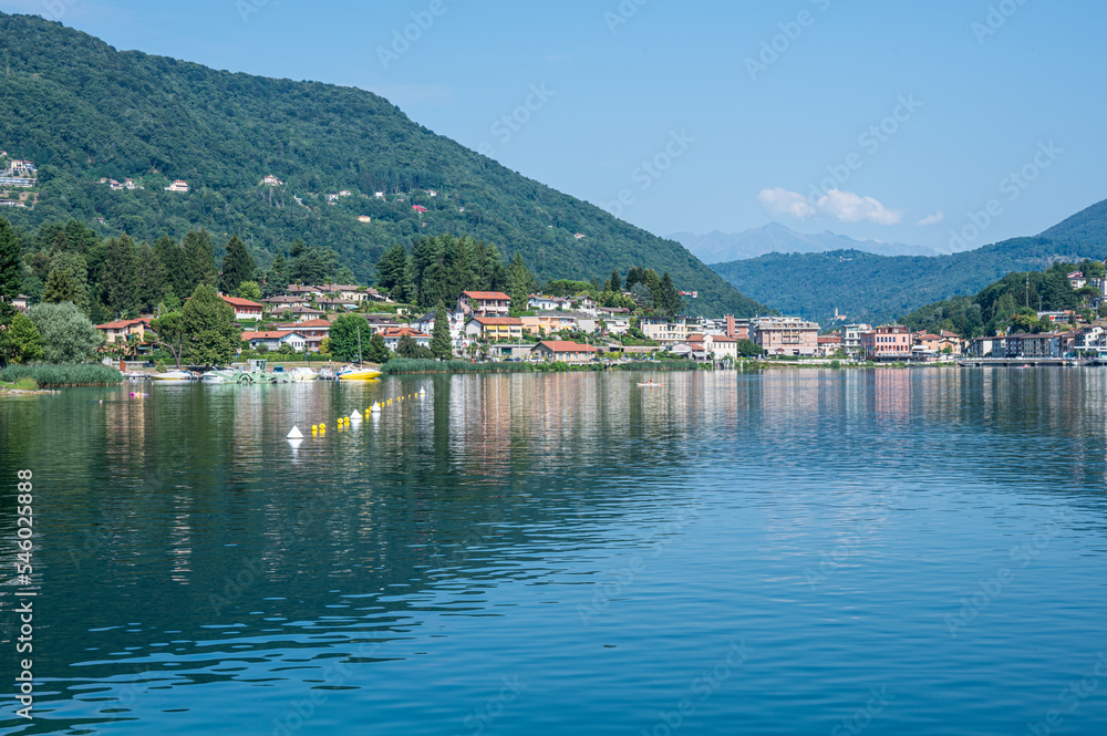 Landscape of the Lake Lugano with Ponte Tresa reflecting on the water