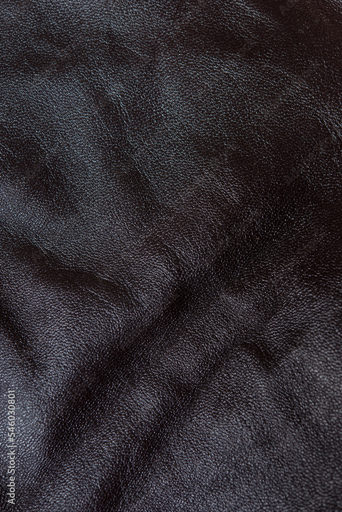 Dark brown cracked leather texture background Dark brown cracked leather texture background