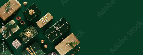 Christmas gift on a green background. Copy space. 