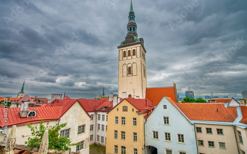 St Nicholas Church and colorful buildings in Tallinn Old Town, Estonia.