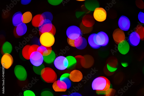 Christmas background. blurred multi-colored lights.