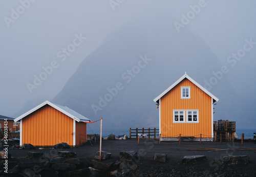 Very popular cabin used as an accommodation. Located in Lofoten Islands on Sakrisoy island. Usually over touristed place but due to coronavirus restrictions totally abandoned. Cabin looks lonely. photo