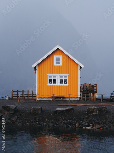 Very popular cabin used as an accommodation. Located in Lofoten Islands on Sakrisoy island. Usually over touristed place but due to coronavirus restrictions totally abandoned. Cabin looks lonely. photo