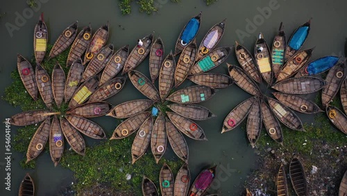 Aerial view of traditional fishing boats along Buriganga river in Keraniganj, Dhaka, Bangladesh. photo