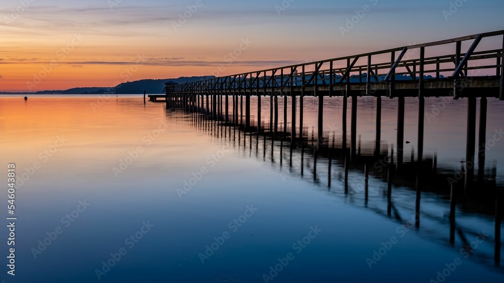 Pier in Harrislee on the Baltic Sea at sunrise
