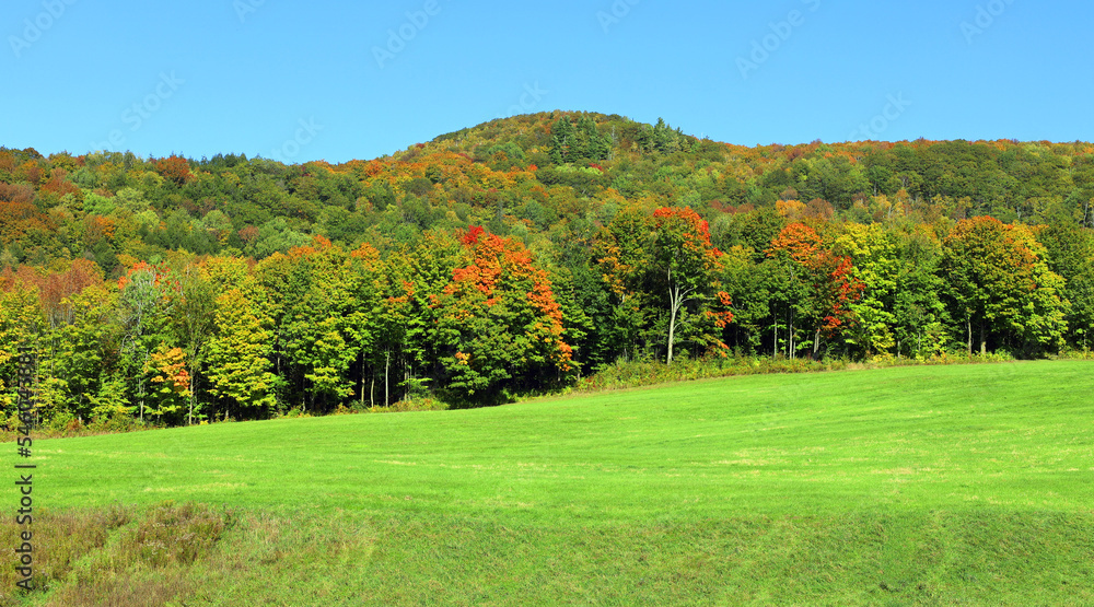 Fall landscape reflection Bromont Eastern Township Quebec province Canada Fall landscape reflection Bromont Eastern Township Quebec province Canada
