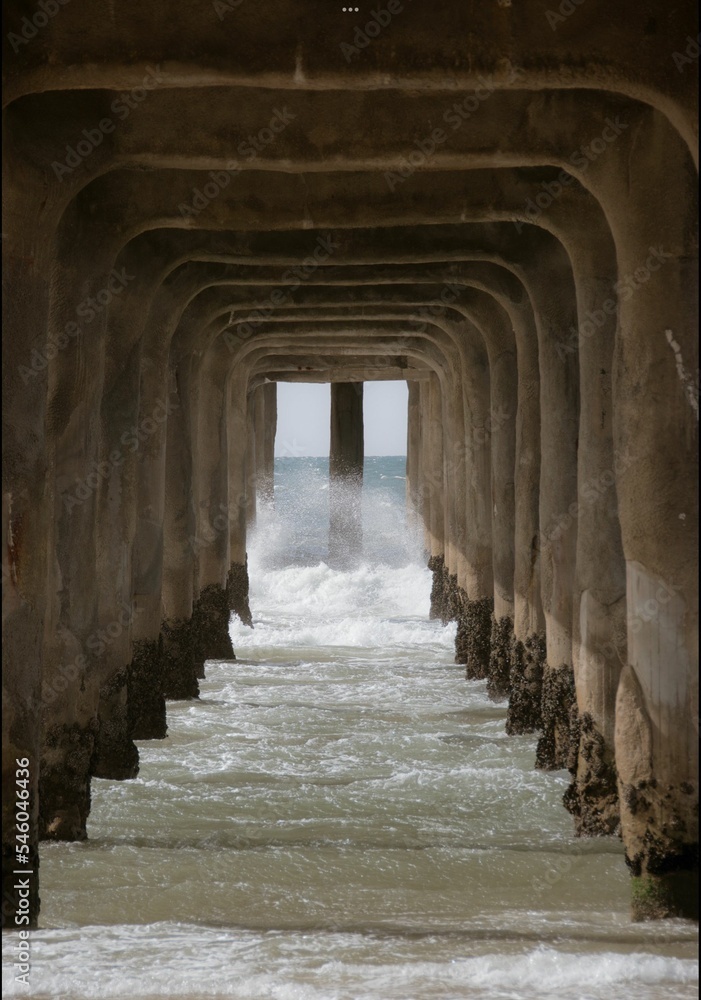Beautiful view under the pier with splashing water