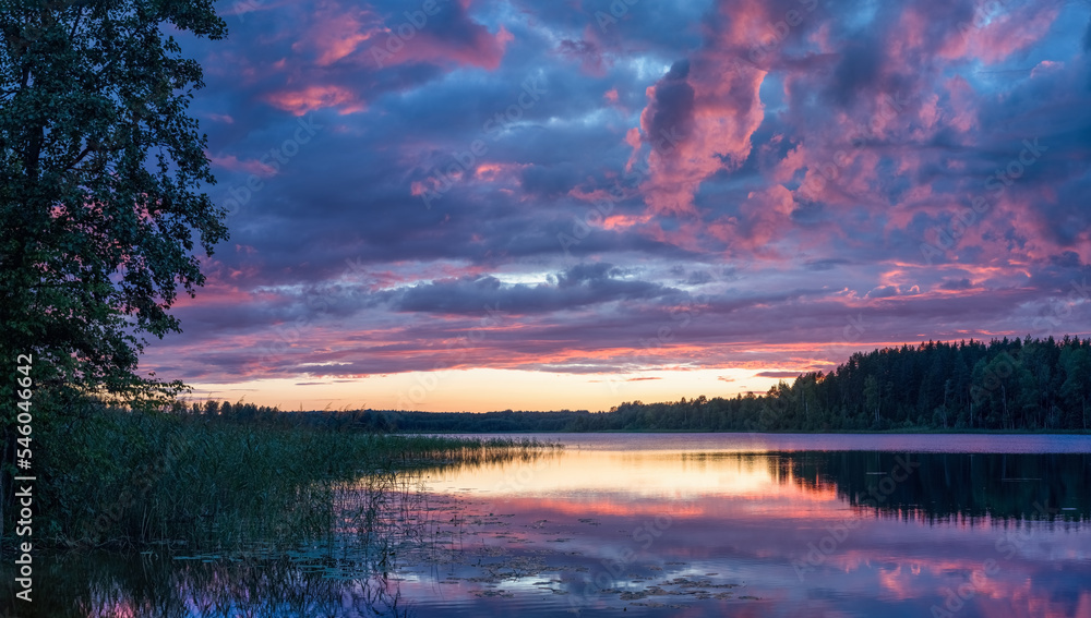 Purplish blue clouds over the lake Purplish blue clouds over the lake