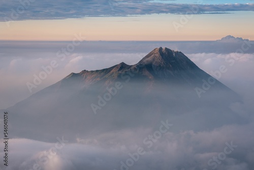 Aerial view of Mount Merapi covered in clouds and fog, in Indonesia