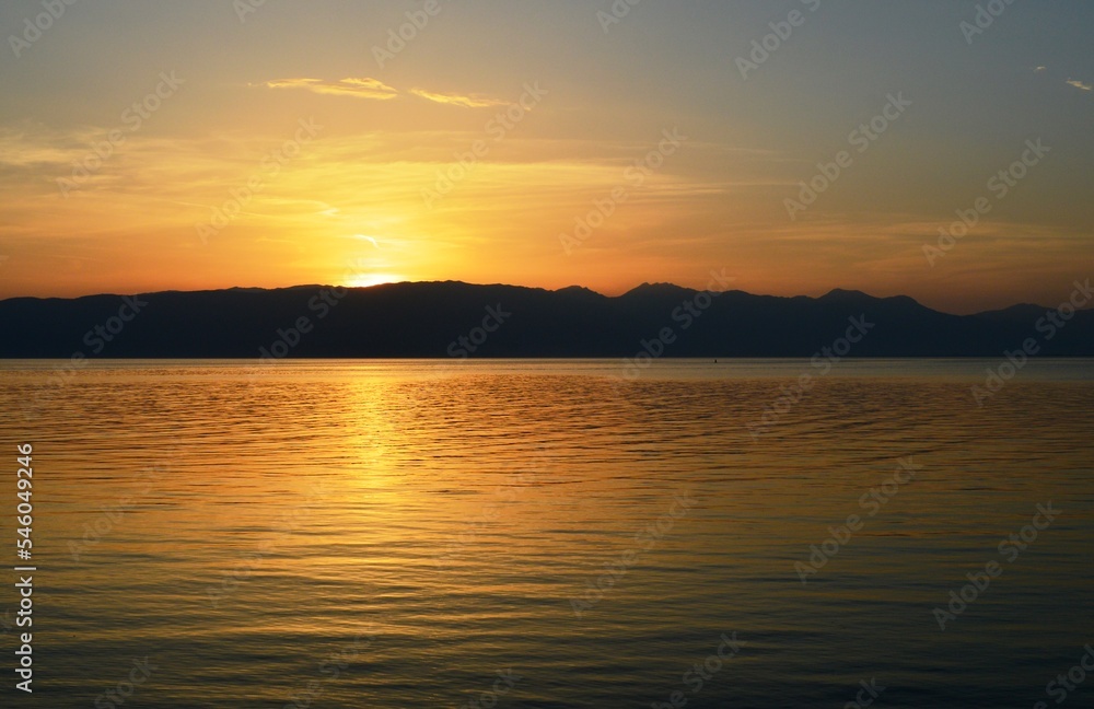 sunset on the shore of the lake