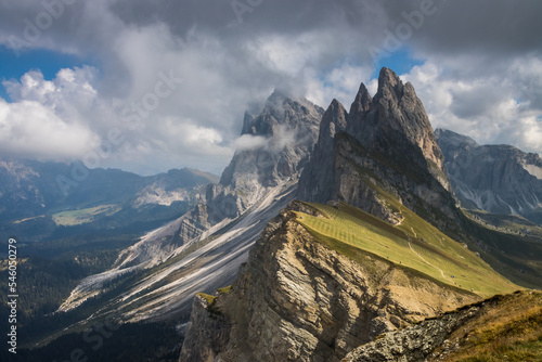 Clouds over mountain massif Odle in Dolomites