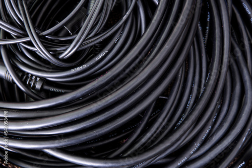 group of black twisted power cables