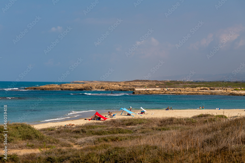 Dor Beach National Park at the end of Summer early Autumn. People enjoying the last warm days of Autumn.
