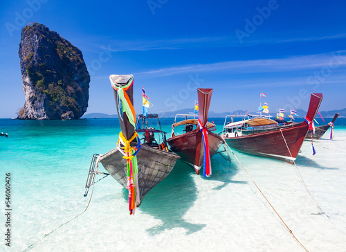 beautiful tropical beach in Thailand with longtail boats © Melinda Nagy