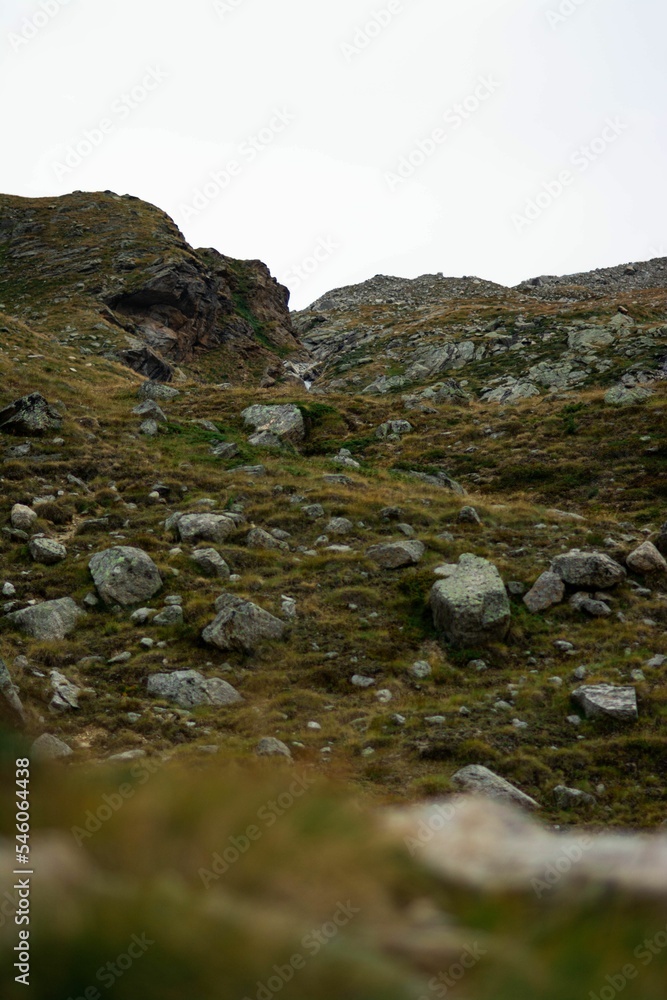Vertical shot of the rocky hills against the background of the sky. Vertical shot of the rocky hills against the background of the sky.