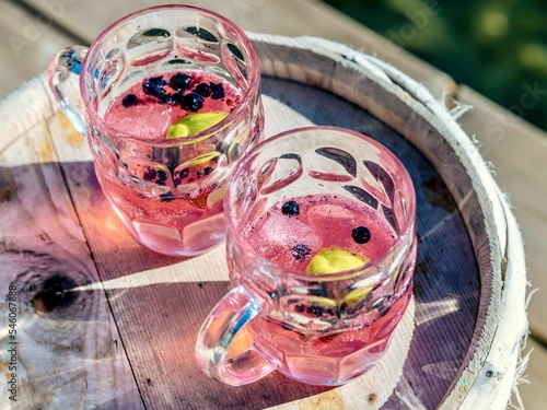 Fotografie Beautiful shot of two glasses of pink lemonades