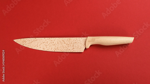 Beige ceramic chef's knife ...