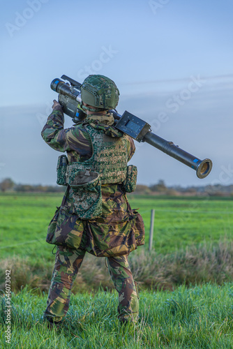 Air defense soldier wit Manpads stinger aiming at a low flying aircraft or helicopter