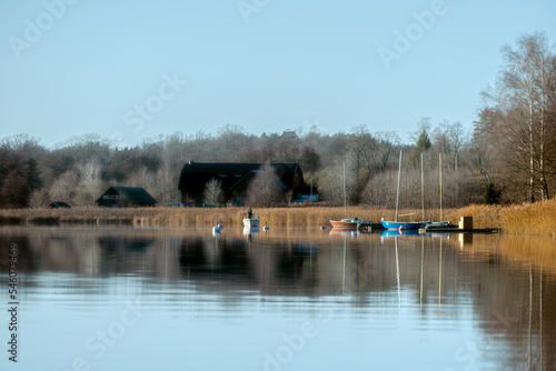 reflections on the lake with boats, värmdö,sverige, sweden © Mats