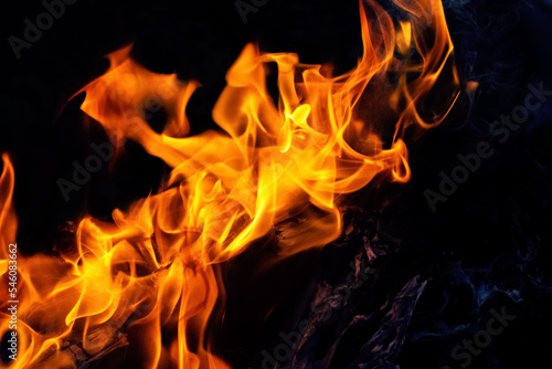 Fire blaze. Abstract blaze, fire on a black background, flame texture for banner, background and textured