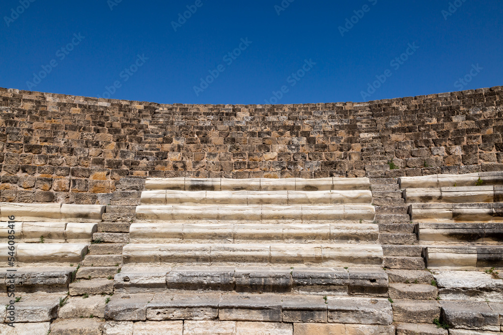 Looking up from the bottom of the amphitheatre in Salamis, Northern Cyprus, with a blue sky overhead Looking up from the bottom of the amphitheatre in Salamis, Northern Cyprus, with a blue sky overhead