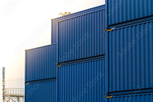 Cargo containers. Cargo container yard. Stack of freight containers at the docks. Industrial yard. Import and export logistic concept.