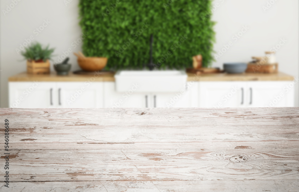 Obraz premium Empty white wooden table in interior of modern kitchen