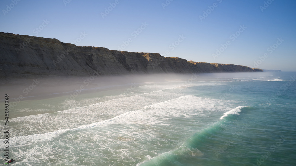 misty cliffs beach