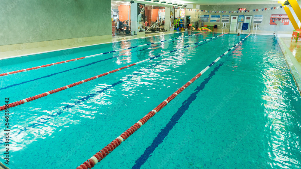 Swimming pool with hand rails at the leisure center