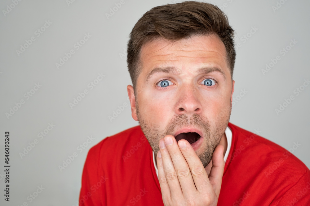 Crazy amazed young man open mouth unbelievable information. Crazy amazed young man open mouth unbelievable information.