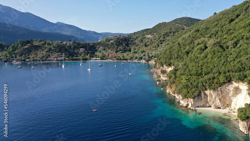 Aerial drone photo of famous small bay and beach with crystal clear sea and caves of Desimi near Nidri in island of Lefkada, Ionian, Greece