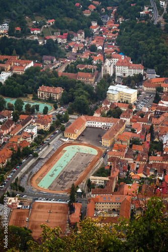Cityscape of Brasov, Romania during the day with buildings and parks