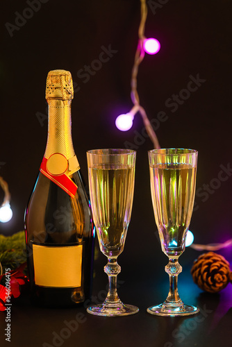 Festive champagne bottle an...