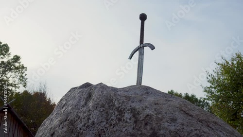 A view of the sword in the stone against the backdrop of the evening sky. High quality 4k footage