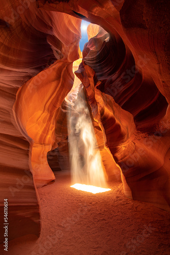 Interior of the Upper Antelope Canyon with one sunbeam filtering between the rocks