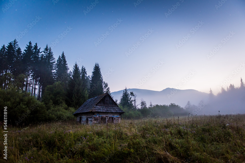 Dawn Under the Kralova Hola, Chamkova Stodola, Misty Morning and Old Wooden Hut in the Mountains