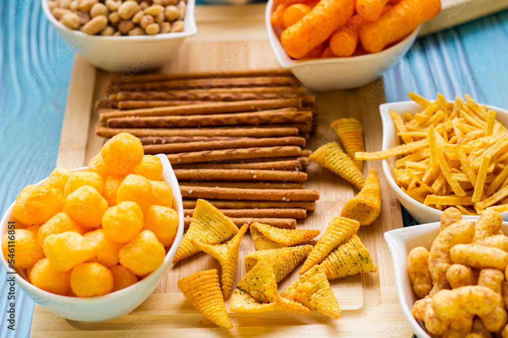 Salty snacks on the table ready to party Salty snacks on the table ready to party